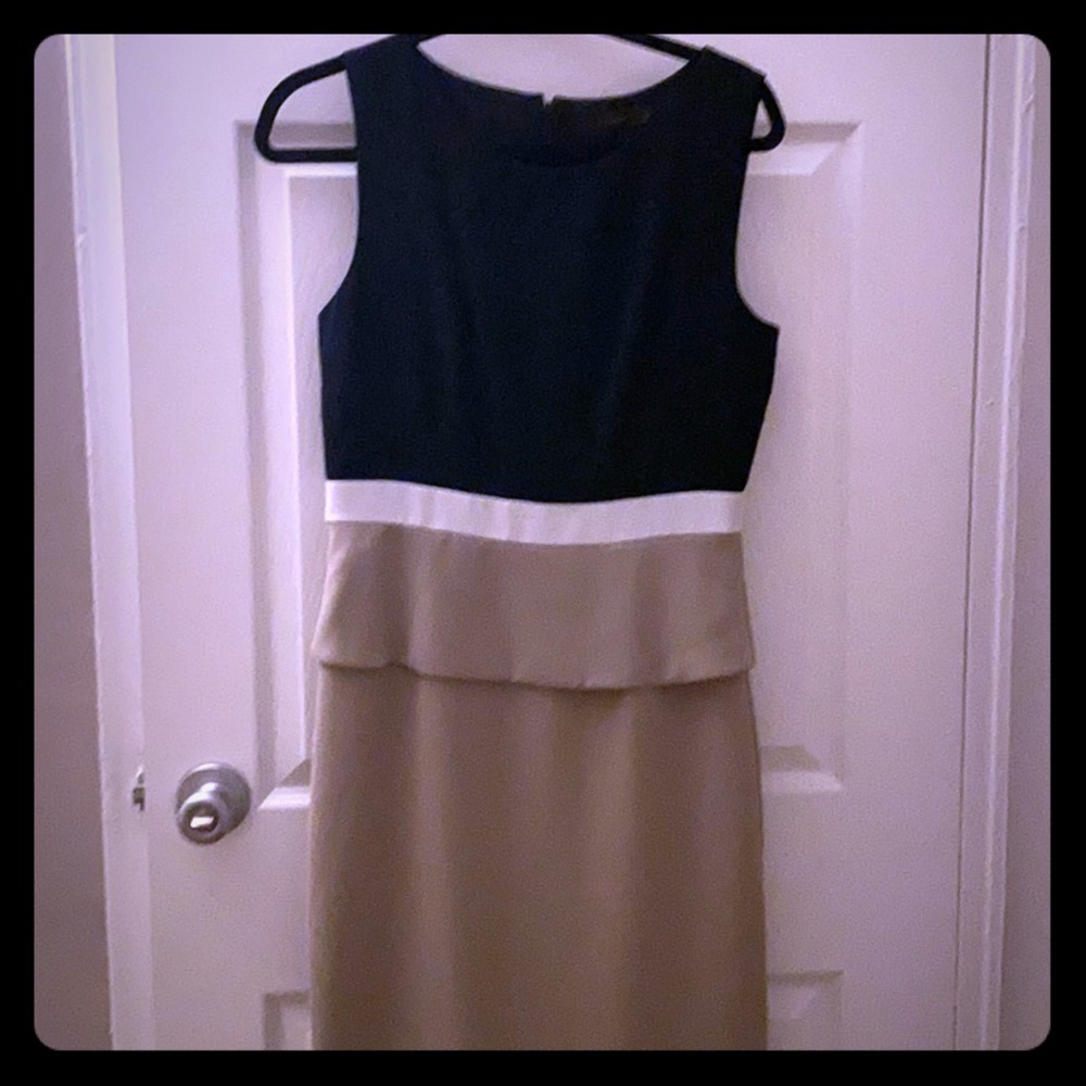 Black tan and white peplum cocktail dress